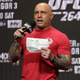 Joe Rogan announces the fighters during a ceremonial weigh in for UFC 264 at T-Mobile Arena on July 09, 2021 in Las Vegas, Nevada.